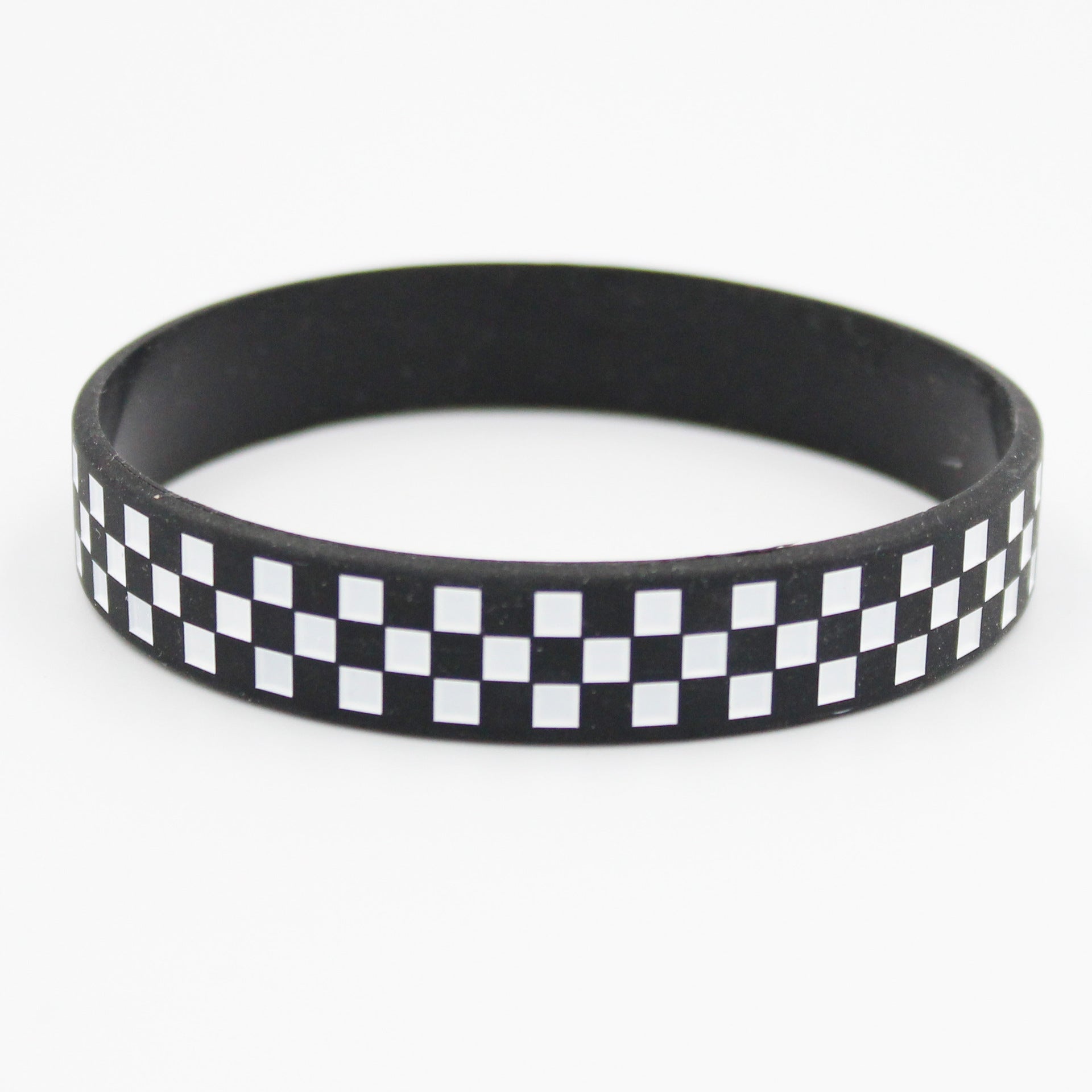 Patrón de cóncavos al por mayor que llena la pulsera de silicona de la cuadrícula en blanco y negro
